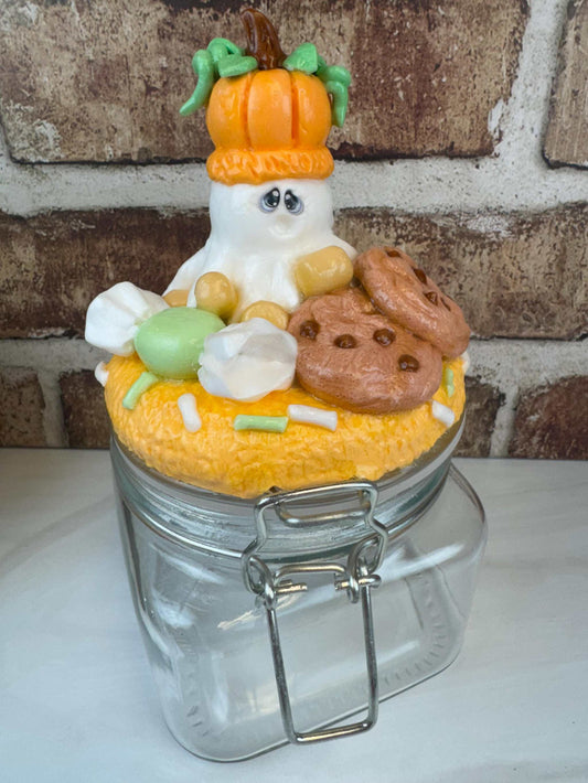 Ghost pumpkin treat jar with ghost, pumpkin, and Halloween cookies design