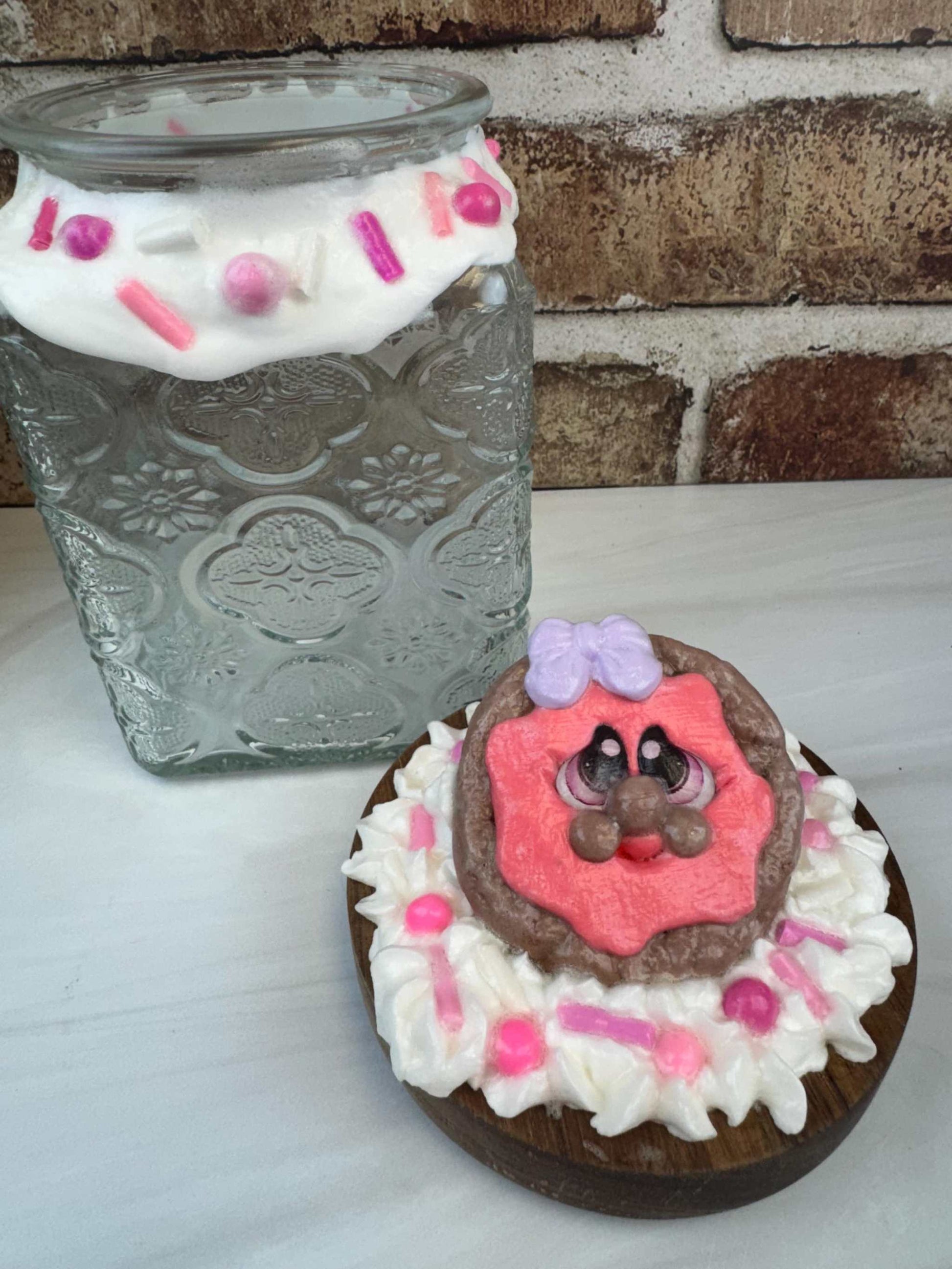 Faux cookie treat jar with hand-painted cookie face and colorful sprinkles, whimsical kitchen decor jar