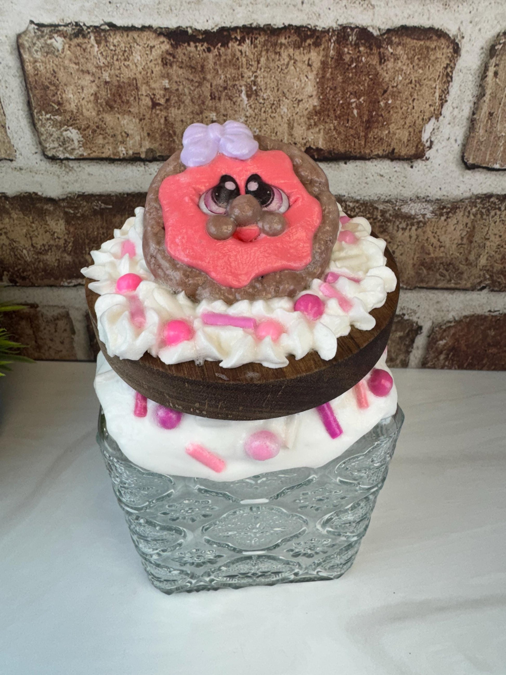 Faux cookie treat jar with colorful sprinkles and hand-painted cookie design kitchen decor